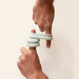 The Ohnut is a stretchy wearable is made from 4 rings that can be linked together or worn individually to control penetration depth and help relieve pain during sex.